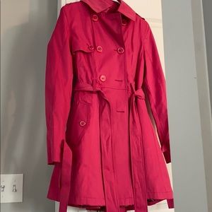 Pink coat.